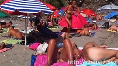 Nudist ladies in natures garb on the beach Thumb