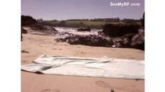 Amateur boy plays with his cock on the beach Thumb